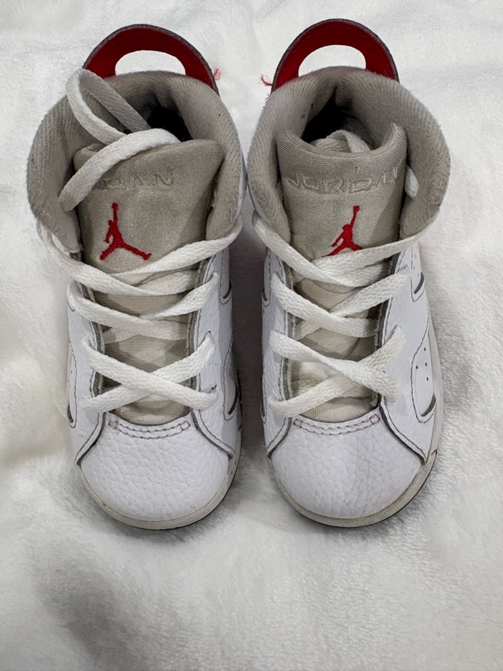 Jordan Kids White Sneakers with Red Jumpman Accents